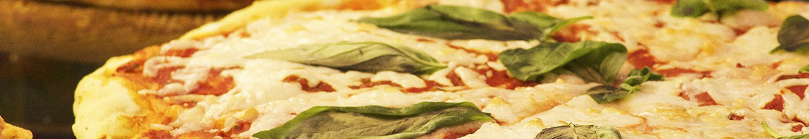 Eating Italian Pizza at La Famiglia Pizza restaurant in Colonie, NY.